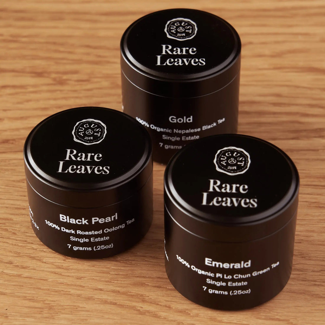 August Uncommon Tea Rare Leaves single origin tea sampler mini tin, featuring a collection of unique teas in a compact tin.