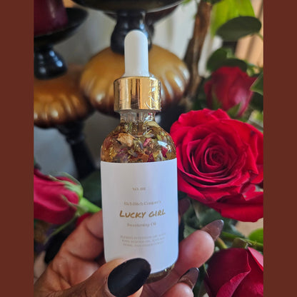 Lucky Rich Girl Hoodoo Conjure Oil by Rich Bitch Conjure, featuring a small glass bottle with a dropper and vibrant label.