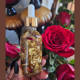Lucky Rich Girl Hoodoo Conjure Oil by Rich Bitch Conjure in a glass bottle with a black cap, labeled as wealth, beauty, and good fortune oil.