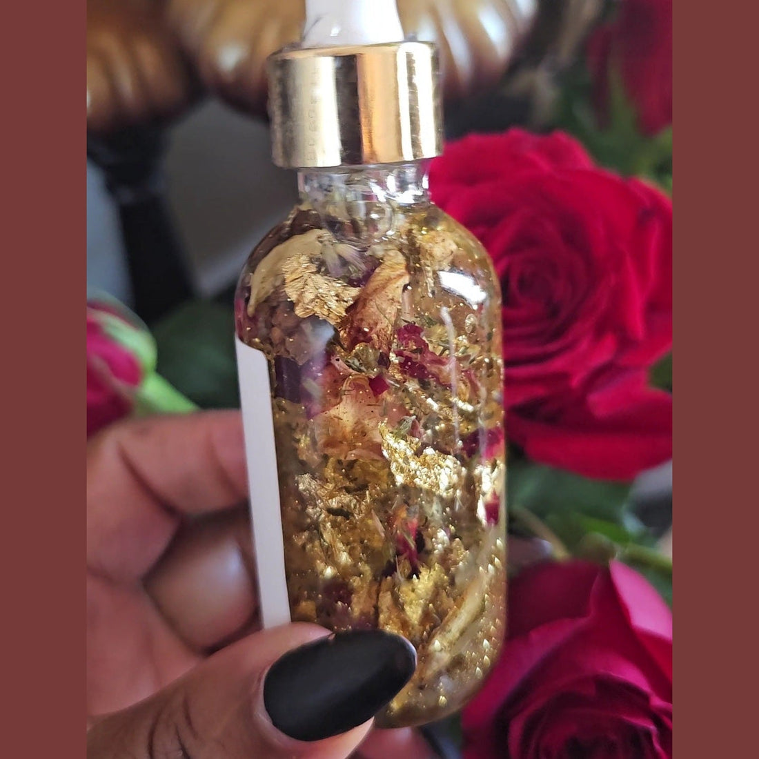 Lucky Rich Girl Hoodoo Conjure Oil by Rich Bitch Conjure, featuring a small bottle with a colorful label used for wealth and good fortune.