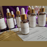 Lucky Rich Girl Hoodoo Conjure Oil by Rich Bitch Conjure, featuring a small glass bottle with gold accents and a mystical label.