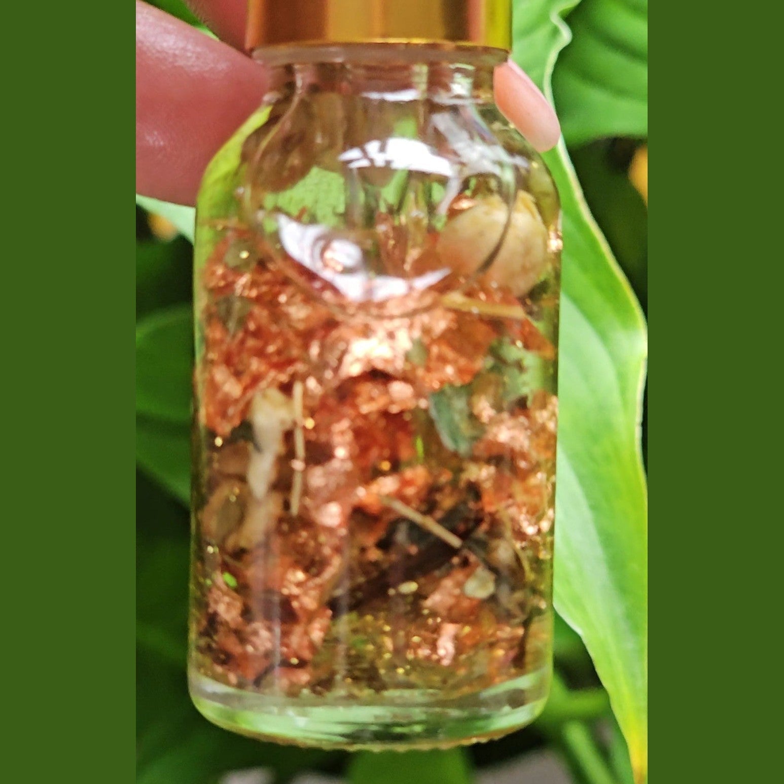 Lucky Rich Girl Hoodoo Conjure Oil by Rich Bitch Conjure, featuring a small glass bottle with gold accents, used for wealth and glamour.