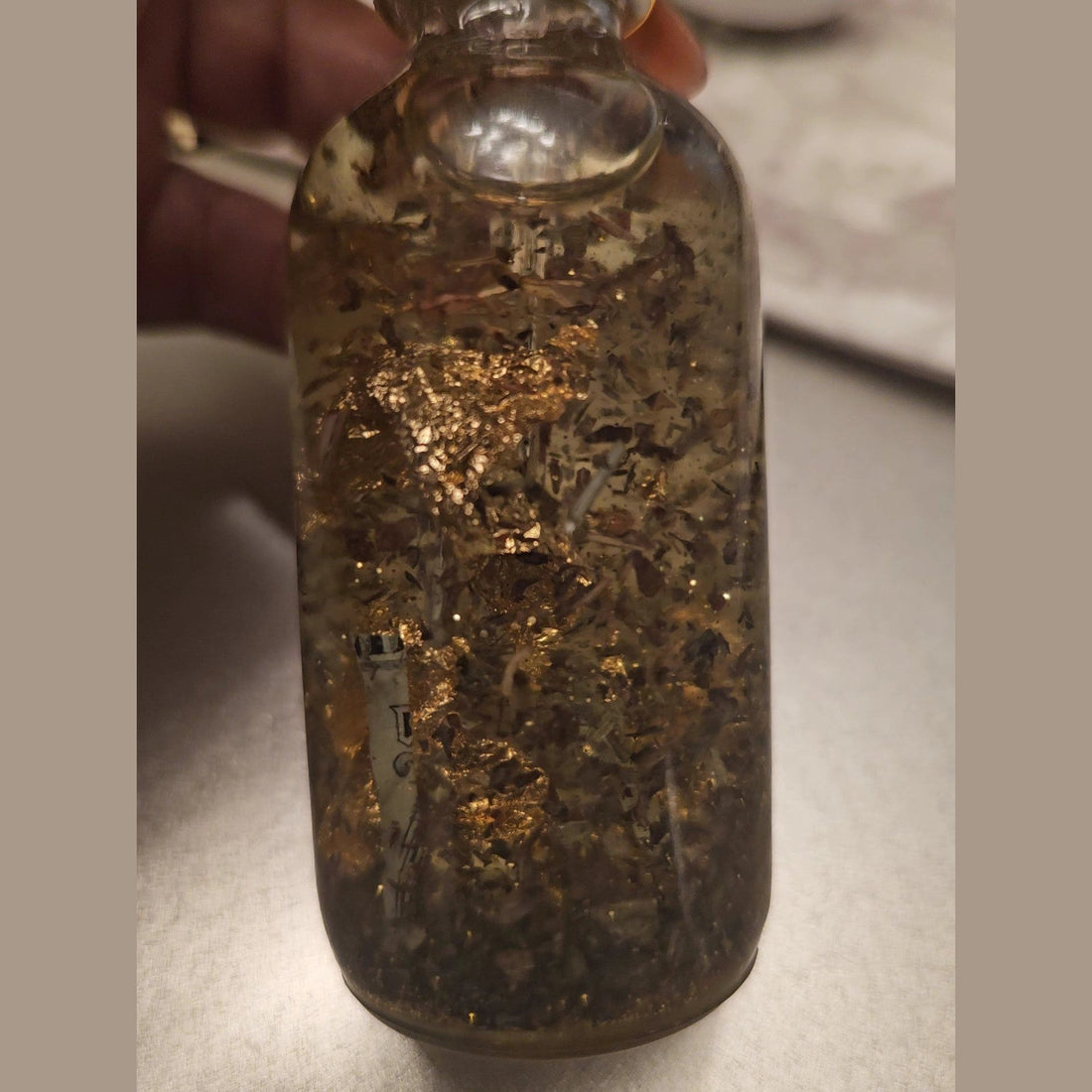 Rich Bitch Conjure Crown of Success Hoodoo Oil in a small glass bottle, designed for success, achievement, and career rituals.