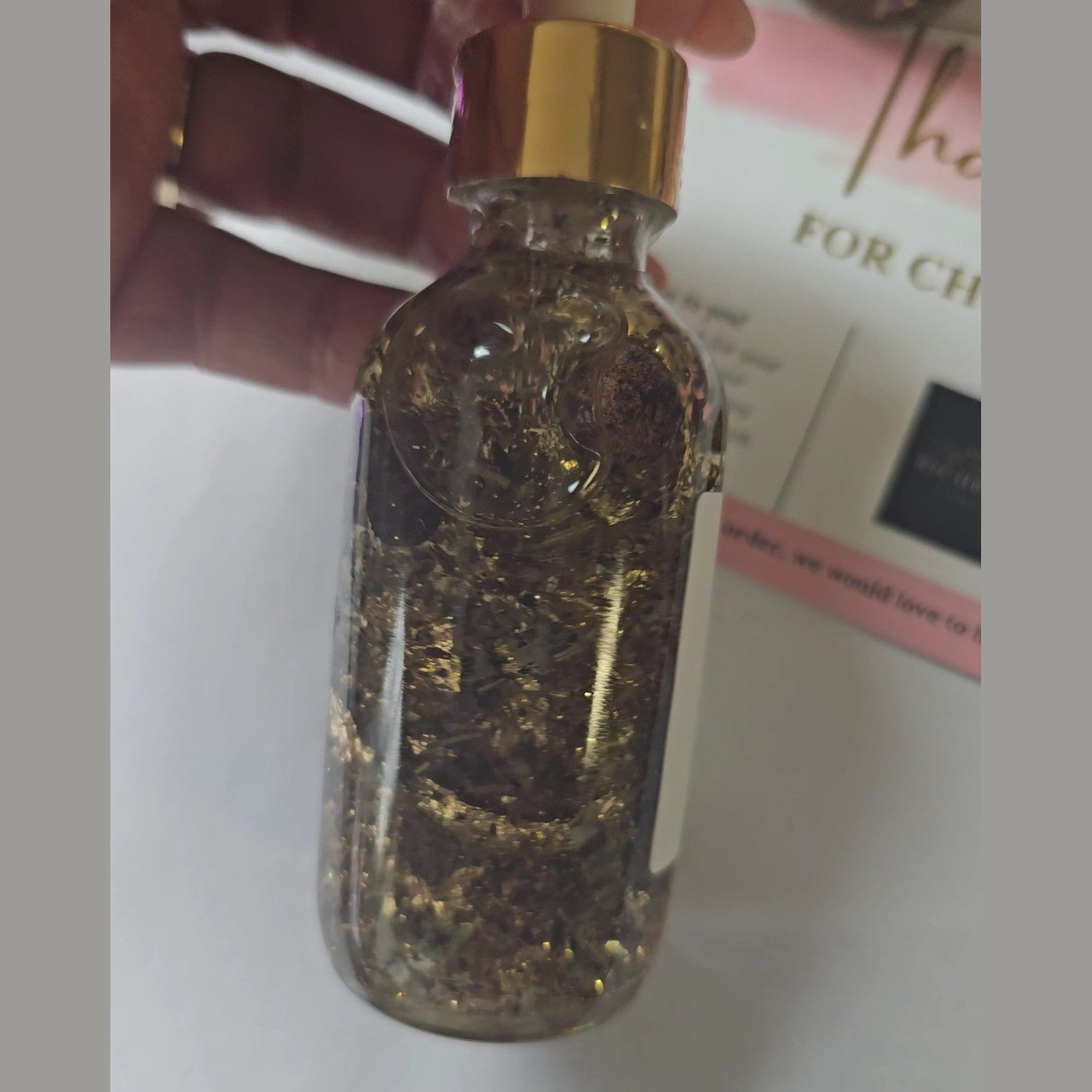 Rich Bitch Conjure Crown of Success Hoodoo Oil in a small glass bottle, designed for achievement, recognition, and career success rituals.