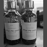 Rich Bitch Conjure Hoodoo Conjure Oil bottle labeled Lust and Passion Oil, used for attraction and desire rituals.