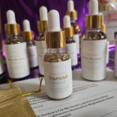 Rich Bitch Conjure Damian Hoodoo Oil for intense domination, featuring dark, aromatic herbal blend in a glass bottle.