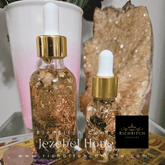 Rich Bitch Conjure Jezebel Honey Oil in a minimalist gray bottle, part of the Hoodoo Oils collection, with a sleek, modern design.