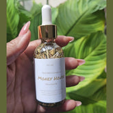 Rich Bitch Conjure Hoodoo Oil bottle labeled Money House Blessing Oil with decorative packaging and branding details.