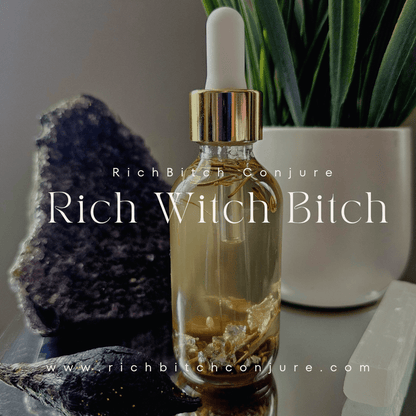 Rich Bitch Conjure Hoodoo Oil bottle with minimalist gray packaging, trendy outfit background, and natural lighting.