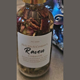Rich Bitch Conjure Hoodoo Oil bottle with label, used for intuition, manifestation, and spiritual power rituals in Hoodoo practices.