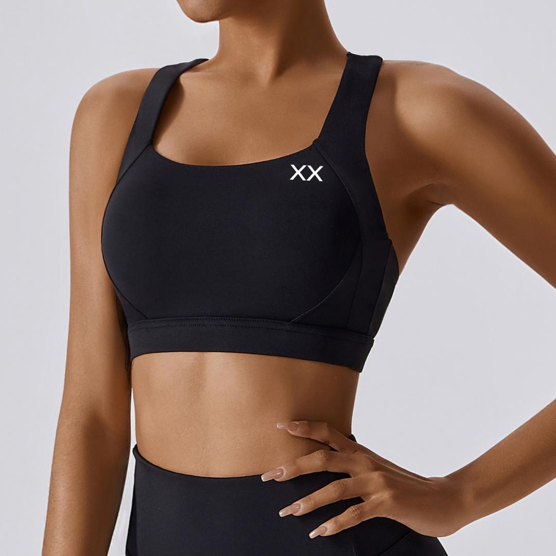 Blackout Barbell Haven Bra featuring a seamless, supportive design with soft fabric and adjustable straps for comfort.