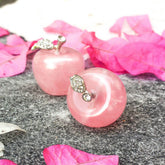 Two polished rose quartz love apples used as elegant home decoration by Conscious Items.