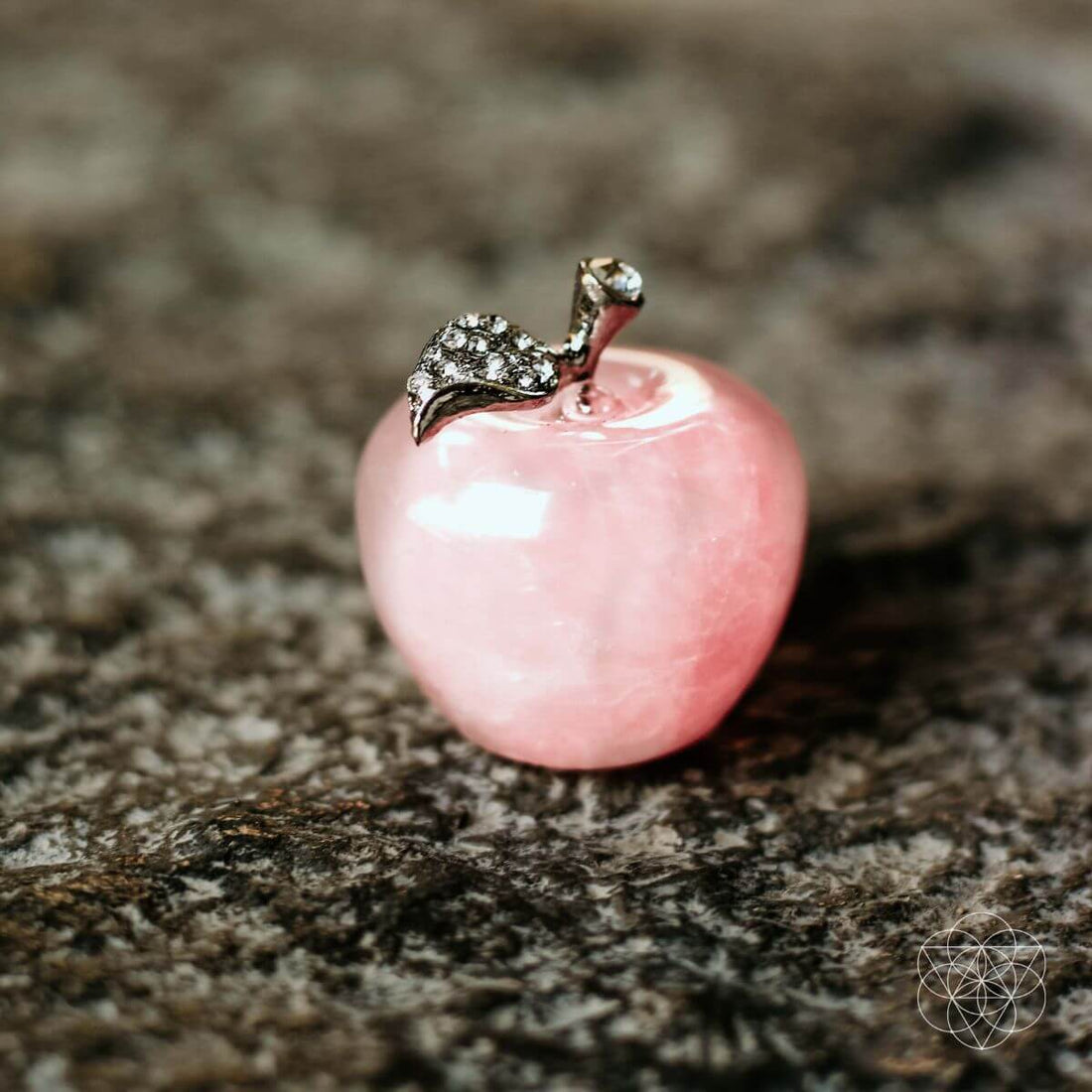 Beautiful rose quartz love apples for home decoration, showcasing smooth, polished pink crystal spheres from Conscious Items.