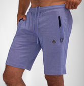 Blue SCR Sportswear Urban Stride all-day wear shorts with 11-inch inseam and zip pockets, ideal for running and casual activities.