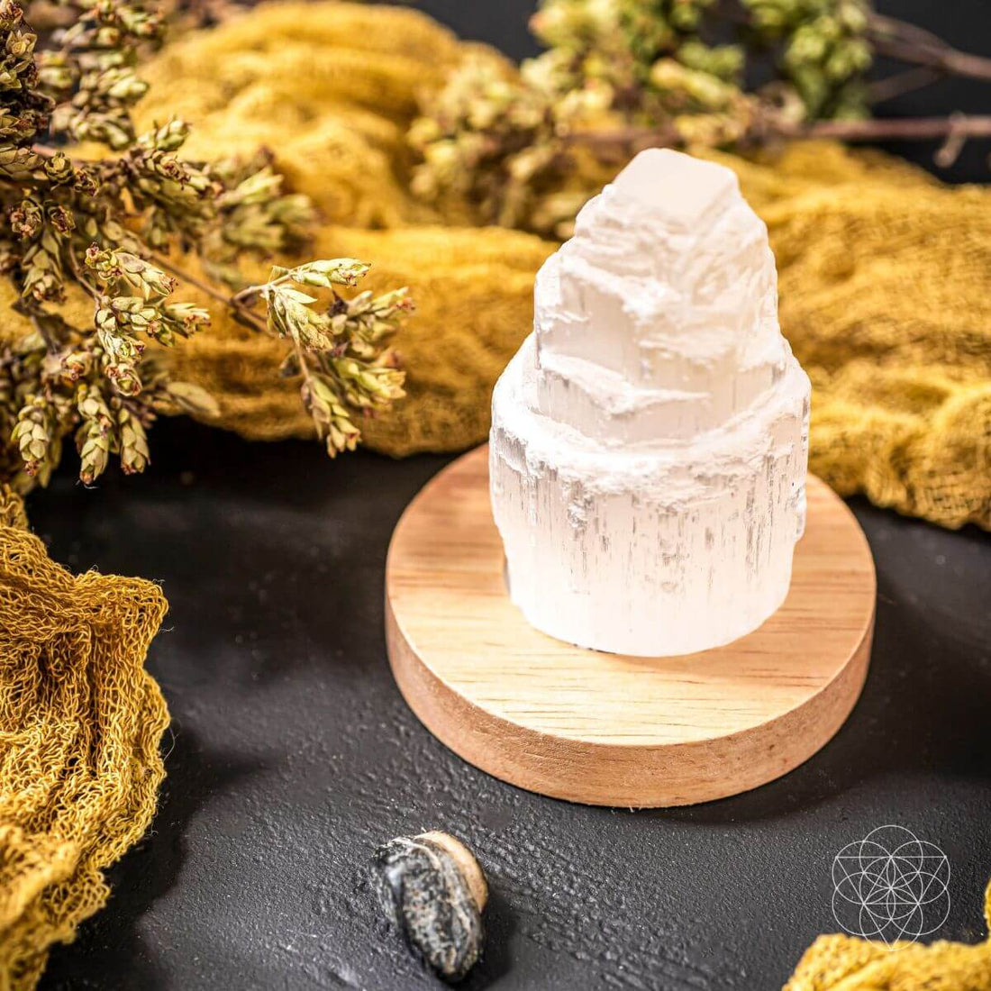 Selenite cleansing lamp night light by Conscious Items with a smooth, polished selenite crystal base emitting soft light