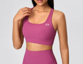Black BLACKOUT BARBELL Vera bra featuring smooth fabric and adjustable straps, designed for comfort and support.