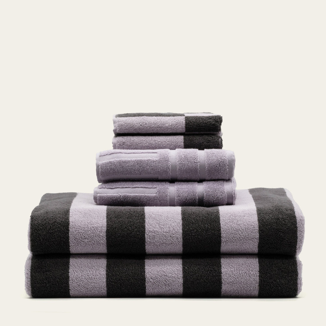 Set of four Shadmoor Australian Cotton Bath Towels by Italic, plush and absorbent, featuring soft white fabric with subtle textured pattern.
