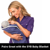 Shield Your Body SYB Baby Beanie paired with a soft blue blanket, cozy and warm for infants and toddlers.