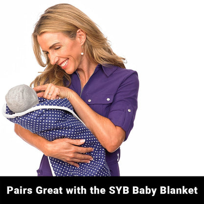Shield Your Body SYB Baby Beanie paired with a soft blue blanket, cozy and warm for infants and toddlers.