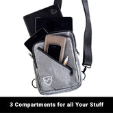 Shield Your Body SYB Sling Bag backpack with interior compartments and adjustable straps, shown with contents inside.