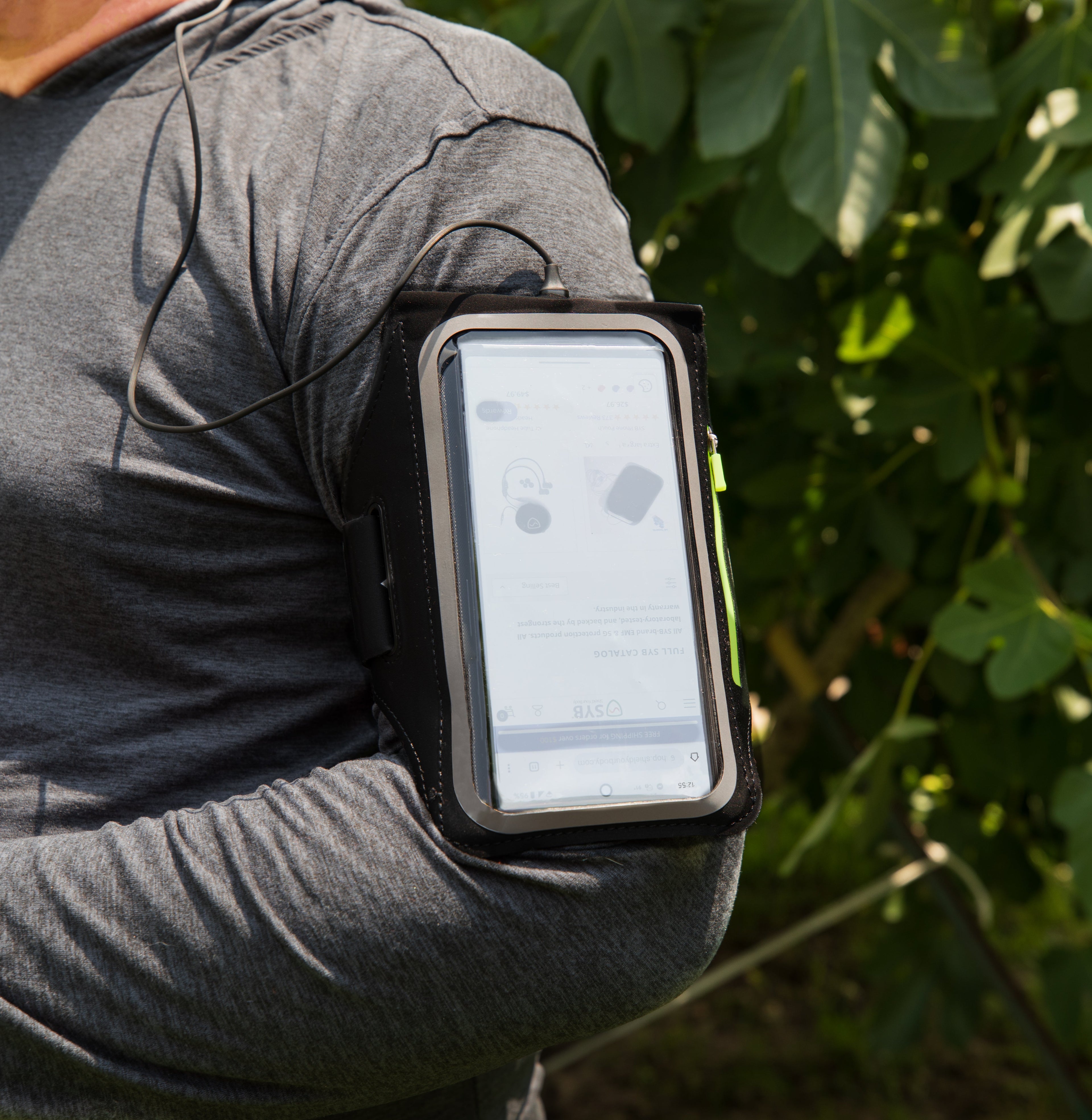 Shield Your Body arm band phone pouch worn on arm, mobile phone accessory for sports and outdoor activities.