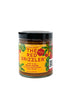 Front view of Simrancooks The Red Drizzler Hot Mojo Picón bottle, showcasing vibrant red chili sauce from Spain&