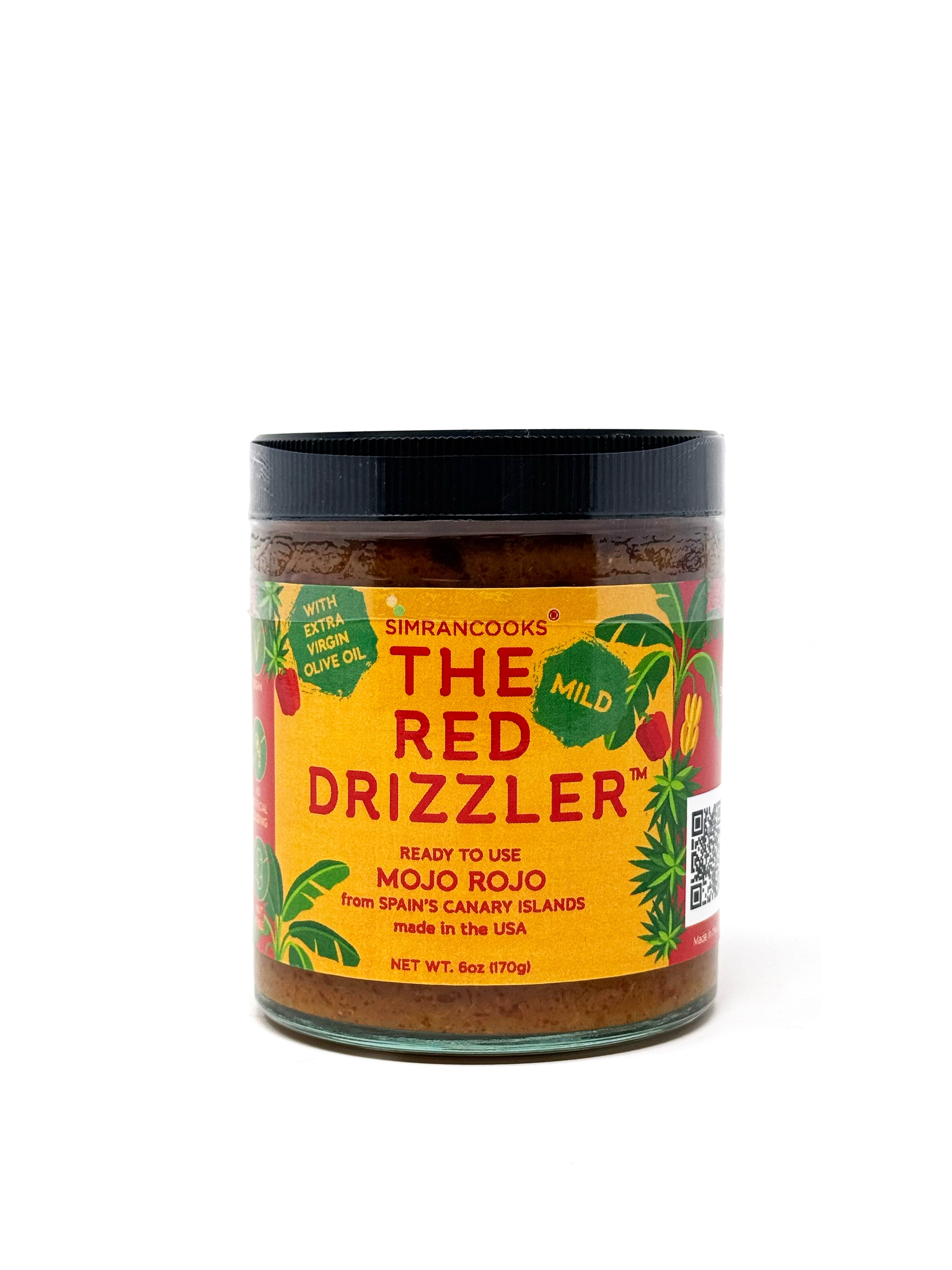 Front view of The Red Drizzler Mojo Rojo mild sauce by Simrancooks, showcasing its vibrant red color and smooth texture.