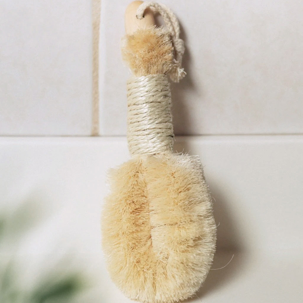 Pretty Farm Girl sisal exfoliating dry brush for skin cleansing and exfoliation, with natural bristles and ergonomic handle.