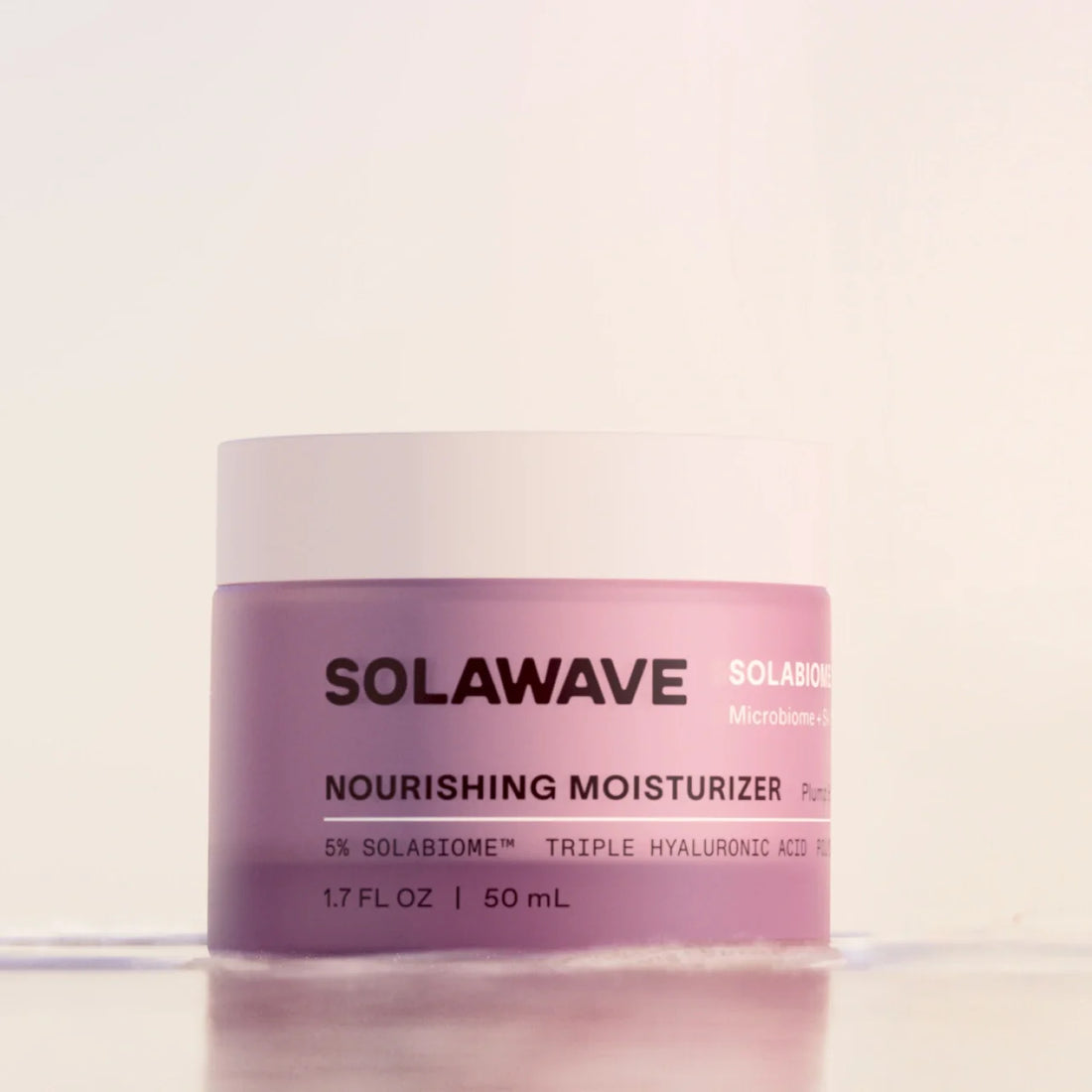 Solawave Pre- &amp; Probiotic Nourishing Moisturizer in a sleek jar, showcasing its creamy, soothing texture for healthy skin.