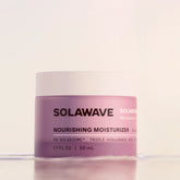 Solawave Pre- & Probiotic Nourishing Moisturizer in a sleek jar, showcasing its creamy, soothing texture for healthy skin.