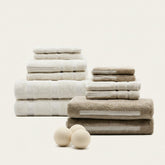 Set of Sorrel Australian cotton towels from Italic, featuring soft, plush texture and natural white color, displayed folded.