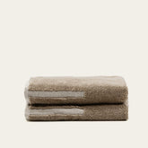 Close-up of Sorrel Australian cotton towel by Italic showing soft, textured fabric with neutral color for luxurious bathroom use.