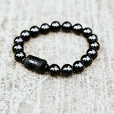 Black Obsidian bracelet from Conscious Items featuring polished beads, designed for soul cleansing and spiritual protection.