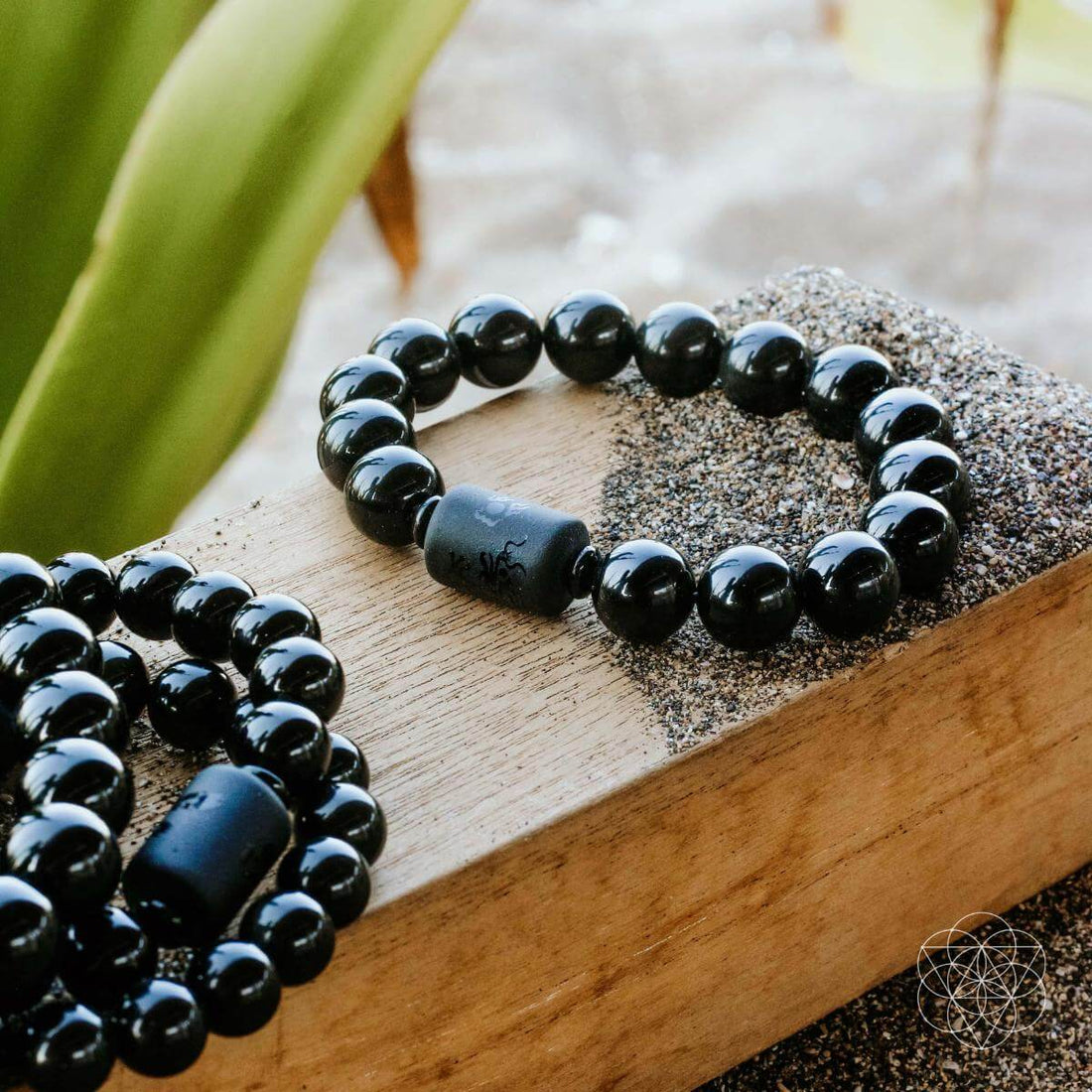 Black obsidian bracelet by Conscious Items featuring smooth, round beads ideal for soul cleansing and spiritual energy.