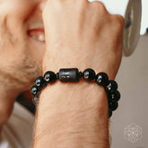 Black Obsidian bracelet from Conscious Items featuring smooth, polished beads for soul cleansing and spiritual protection.