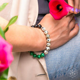 Dalmatian Jasper healing bracelet by Conscious Items featuring black and white spotted stones on an elastic band.