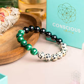 Dalmatian Jasper bracelet from Conscious Items featuring healing properties and natural spotted stone design.