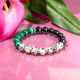 Dalmatian Jasper bracelet by Conscious Items featuring black and white spotted stones for healing and energy balance.