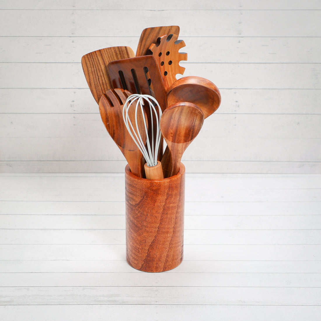 Set of acacia wooden spoons in containers from Spice Wheel, showcasing natural wood grain and practical storage design.