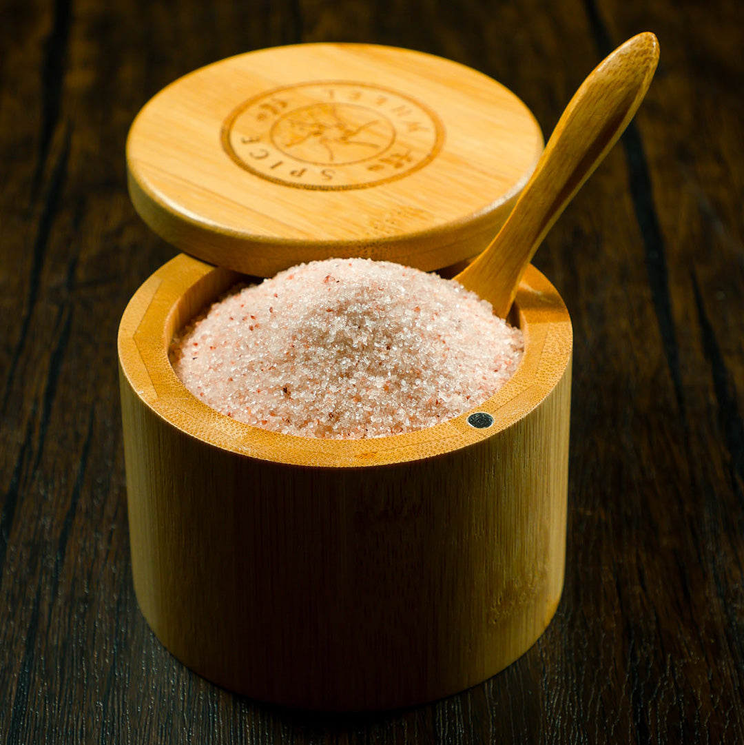 Bamboo salt container filled with pink Himalayan salt, Spice Wheel storage container for kitchen spices and salts.