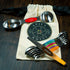 Set of Spice Wheel magnetic spoons with built-in leveler in a canvas gift bag for easy storage and organization.