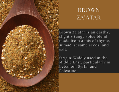 Glass jar of brown Za’atar spice from Spice Wheel, showing a close-up of the aromatic herb blend in a clear container.