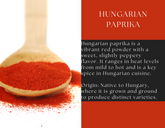 Hungarian paprika in a glass jar from Spice Wheel, vibrant red ground spice perfect for cooking and seasoning.