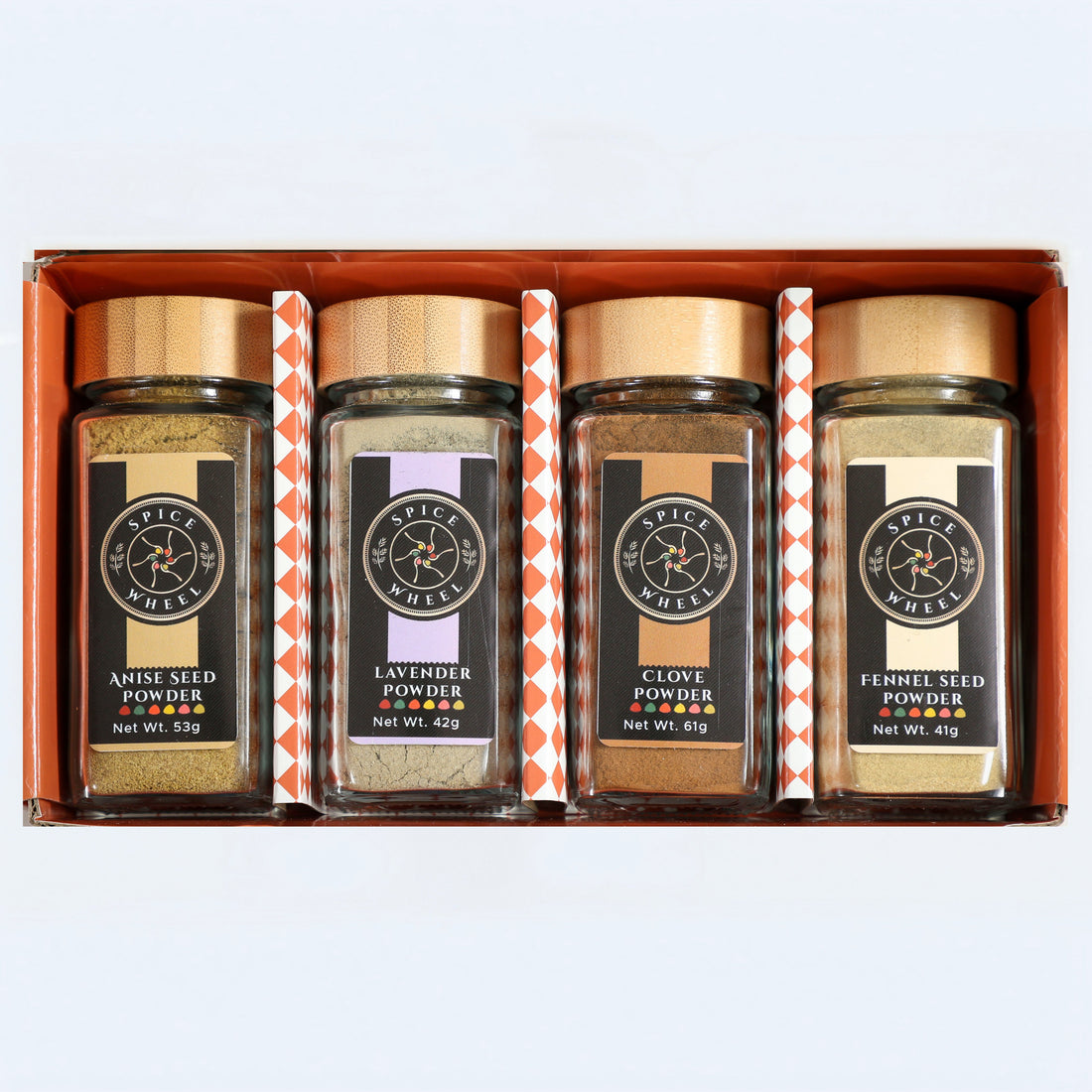 Spice Wheel Baking Botanicals gift set featuring lavender, anise, clove, and fennel spices in a 4-pack.