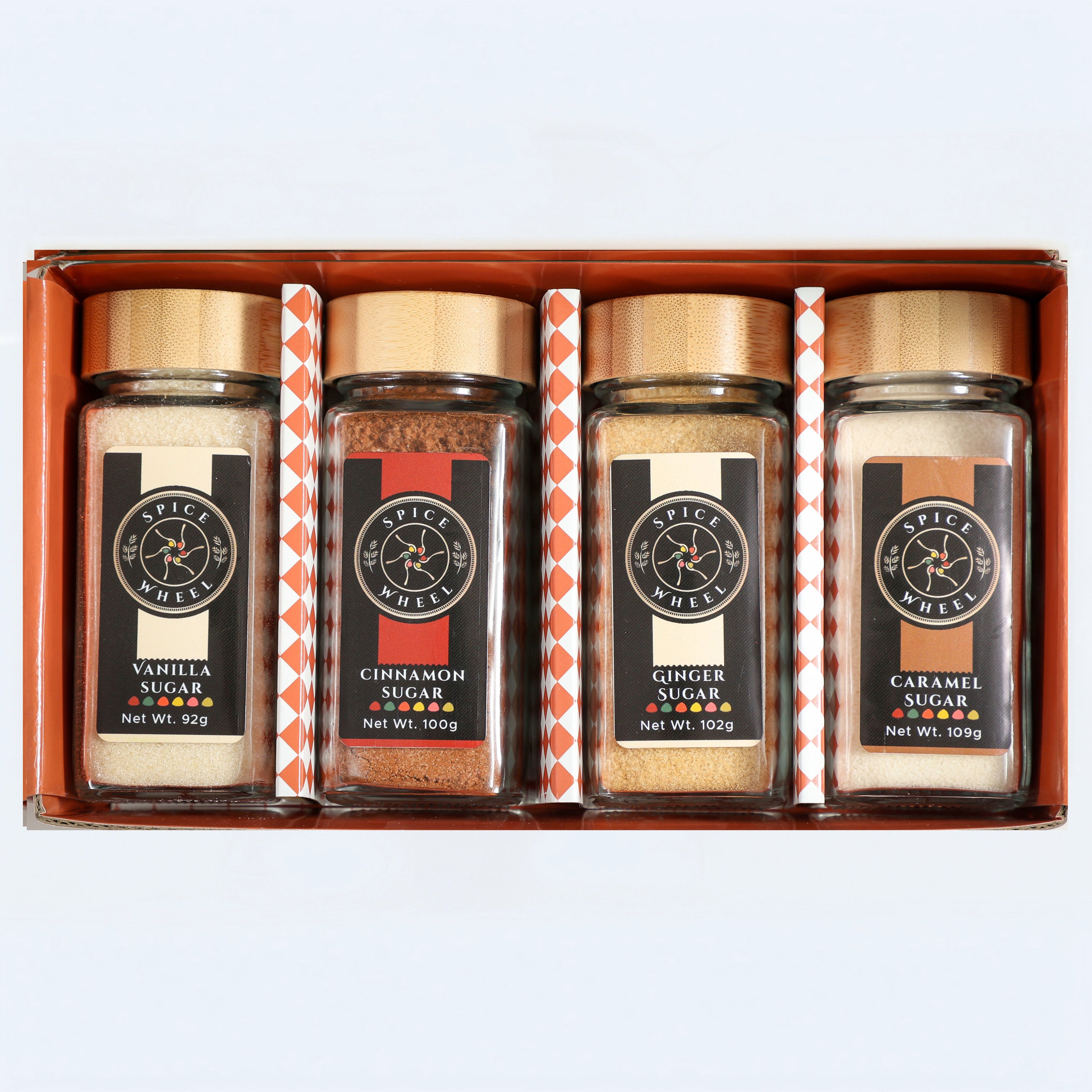 Spice Wheel Cozy Sugar Gift Set with vanilla, cinnamon, ginger, and caramel spice blends in a 4-pack.
