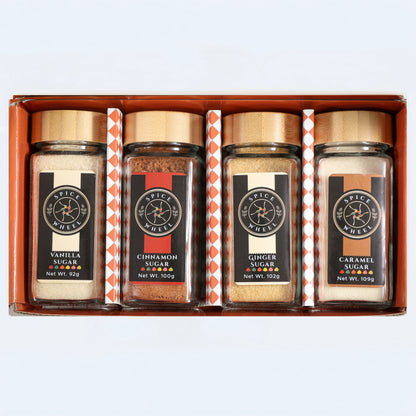 Spice Wheel Cozy Sugar Gift Set with vanilla, cinnamon, ginger, and caramel spice blends in a 4-pack.