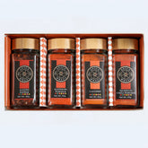 Fiery Four Spice Wheel gift set with four colorful chili peppers representing global hot spices in a spice collection.