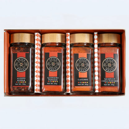 Fiery Four Spice Wheel gift set with four colorful chili peppers representing global hot spices in a spice collection.