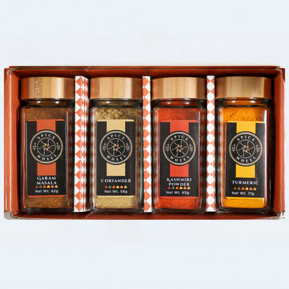 Indian Spice Gift Set by Spice Wheel, includes four spice jars in a starter kit, showcasing vibrant Indian spices in small containers.