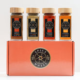 Indian Spice Gift Set with four spice jars from Spice Wheel, featuring colorful packaging and a variety of authentic Indian spices.